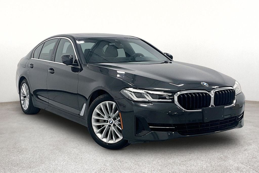2023 BMW 5 Series 530i xDrive in Dark Graphite — front three-quarter view