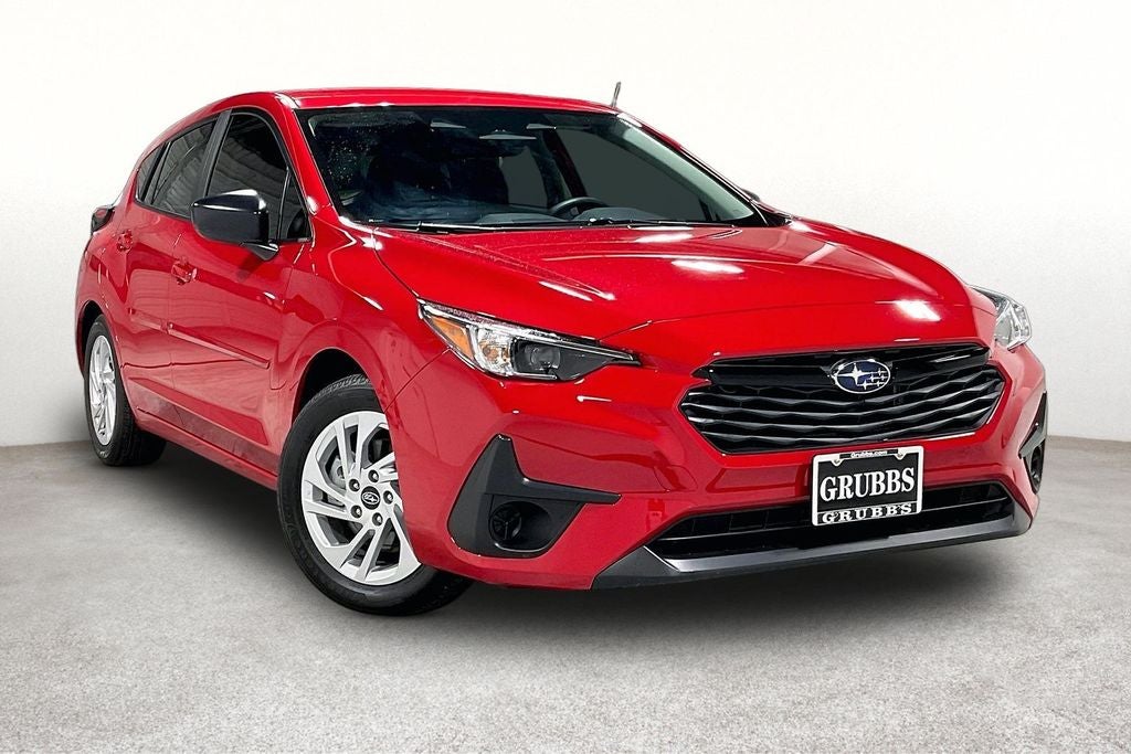 2025 Subaru Impreza Base in Pure Red — front three-quarter view