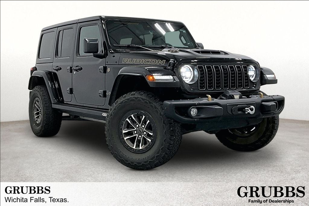 2024 Jeep Wrangler Rubicon 392 in Black Clearcoat — front three-quarter view