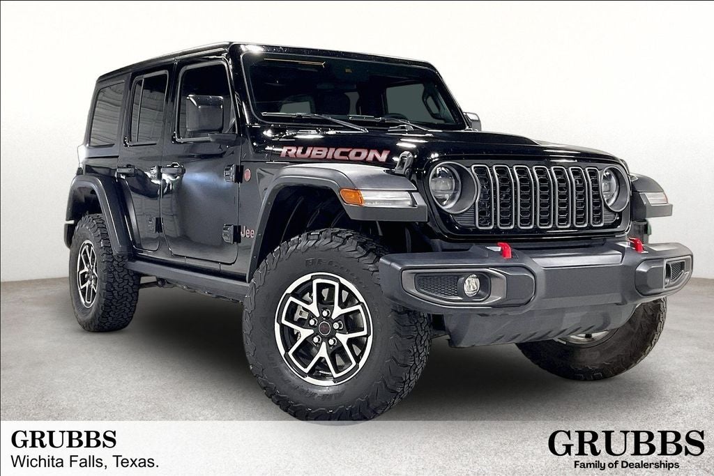 2024 Jeep Wrangler Rubicon in Black Clearcoat — front three-quarter view