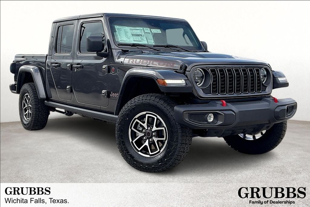 2025 Jeep Gladiator GLADIATOR RUBICON 4X4 in Granite Crystal Metallic Clear-Coat Exterior Paint — front three-quarter view