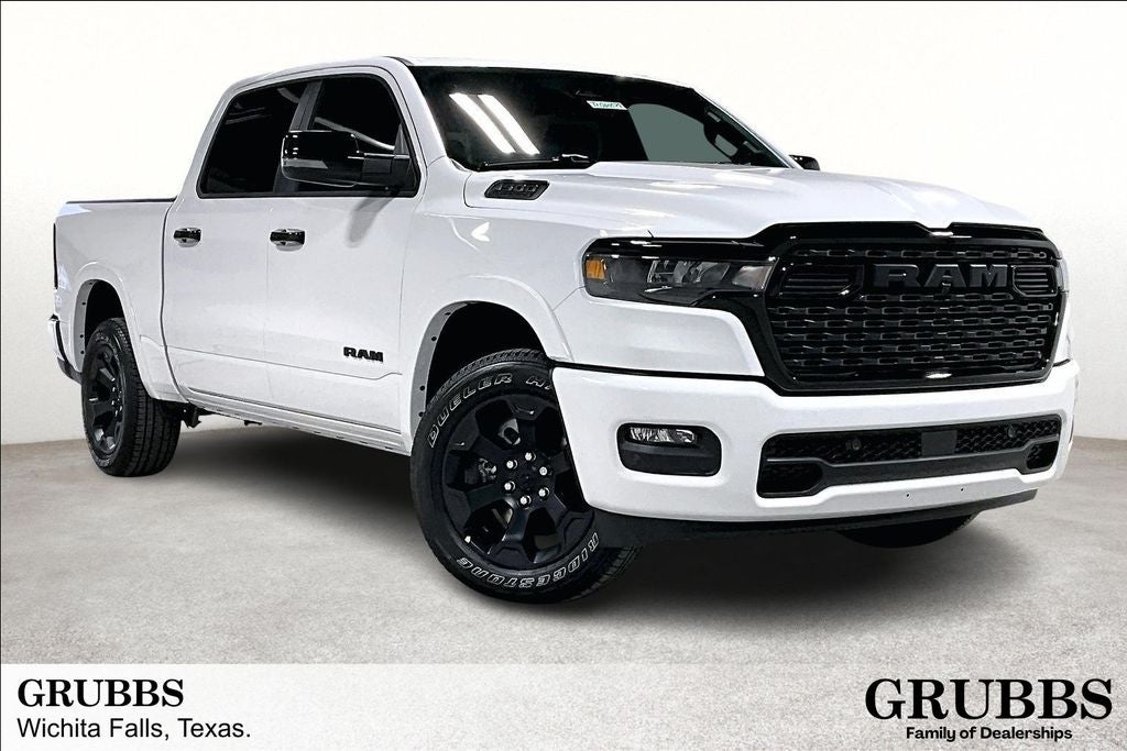 2026 RAM Ram 1500 RAM 1500 BIG HORN CREW CAB 4X4 5'7' BOX in Bright White Clear-Coat Exterior Paint — front three-quarter view