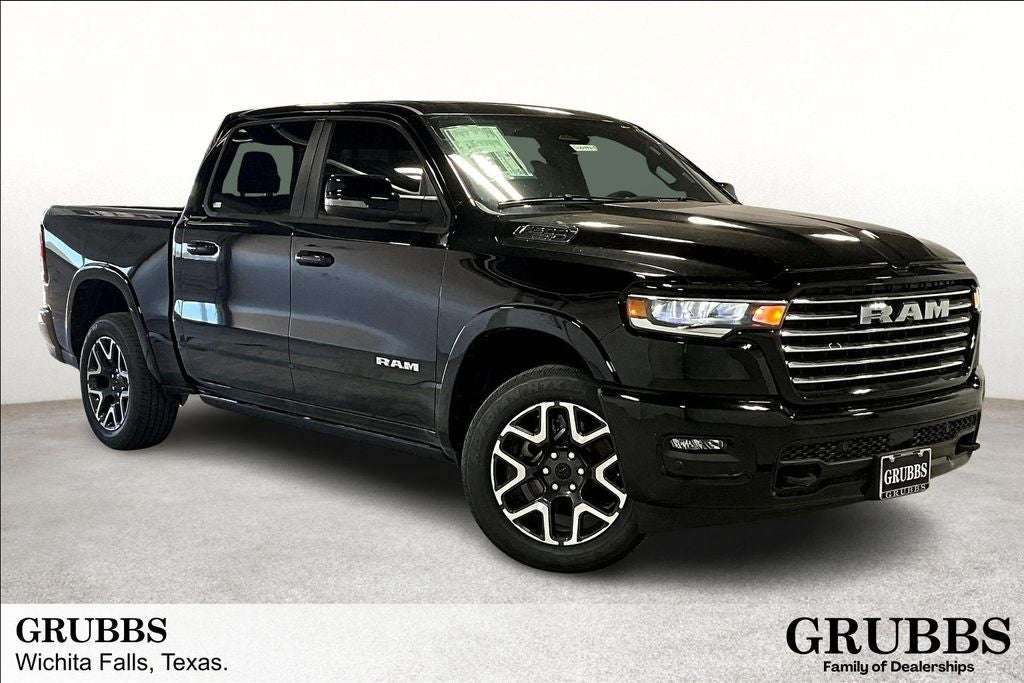 2025 RAM Ram 1500 RAM 1500 LARAMIE CREW CAB 4X4 5'7' BOX in Diamond Black Crystal Pearl-Coat Exterior Paint — front three-quarter view
