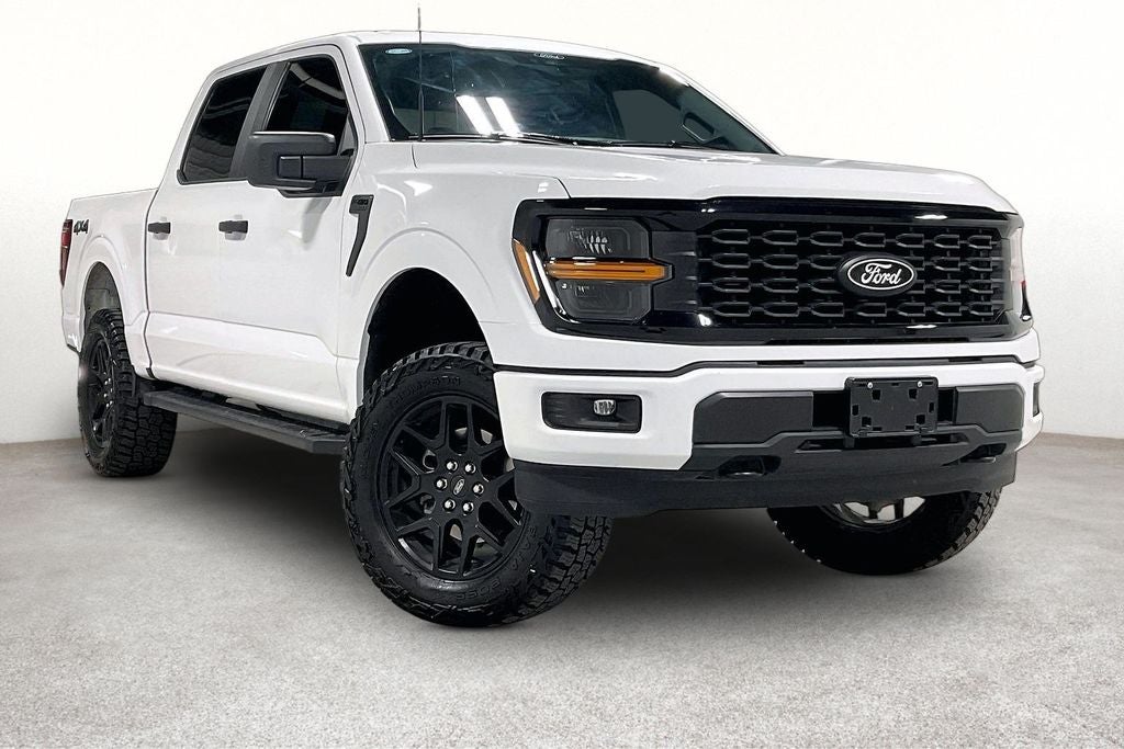 2025 Ford F-150 STX in Oxford White — front three-quarter view