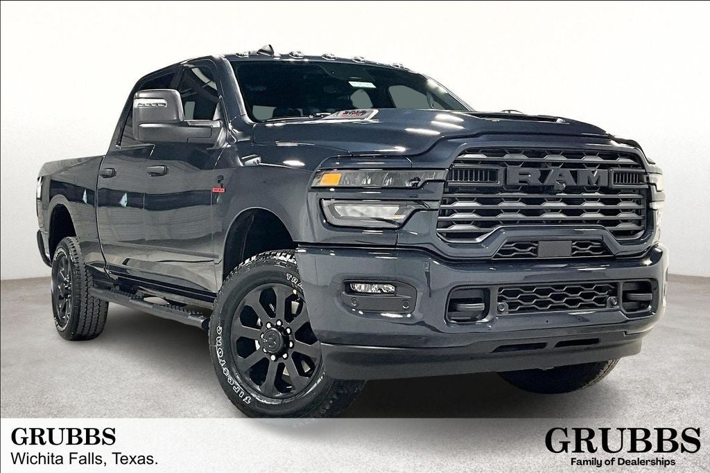 2026 RAM Ram 2500 RAM 2500 BLACK EXPRESS CREW CAB 4X4 6'4' BOX in Forged Blue Metallic Exterior Paint — front three-quarter view