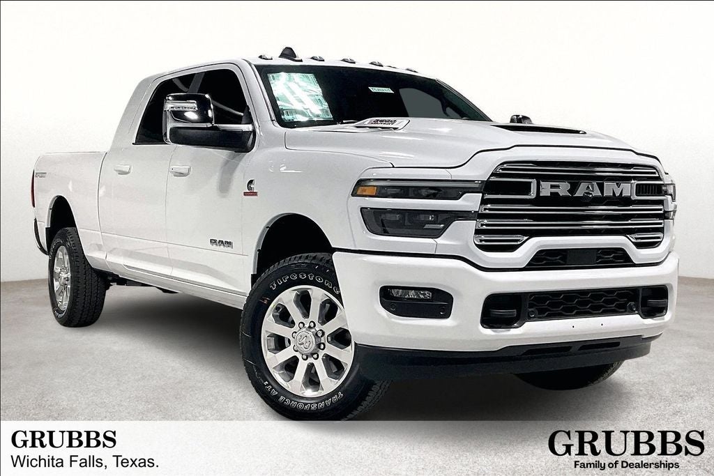 2026 RAM Ram 2500 RAM 2500 LARAMIE MEGA CAB 4X4 6'4' BOX in Bright White Clear-Coat Exterior Paint — front three-quarter view