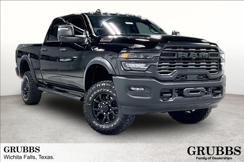 2026 RAM Ram 2500 RAM 2500 TRADESMAN CREW CAB 4X4 6'4' BOX in Diamond Black Crystal Pearl-Coat Exterior Paint — front three-quarter view