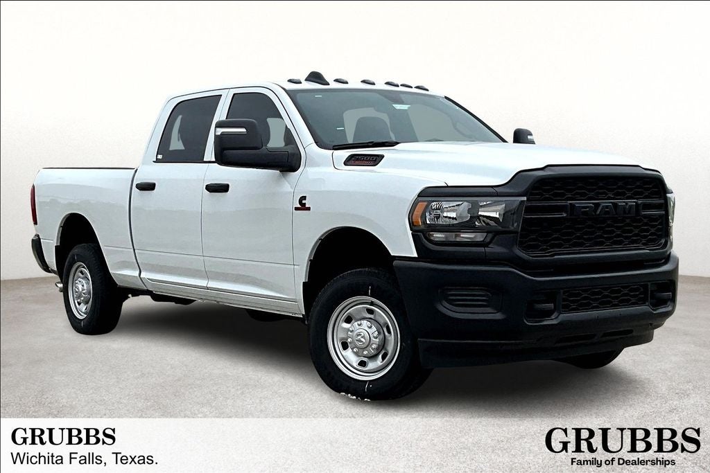2024 RAM Ram 2500 RAM 2500 TRADESMAN CREW CAB 4X4 6'4' BOX in Bright White Clear-Coat Exterior Paint — front three-quarter view